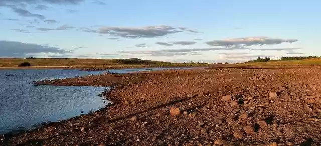 Free download Scottish Loch Rocky Beach Water -  free photo or picture to be edited with GIMP online image editor
