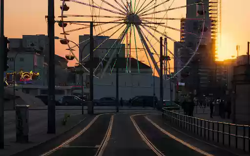 A ferris wheel at sunset on a street from Chrome web store to be run with OffiDocs Chromium online A ferris wheel at sunset on a street from Chrome web store to be run with OffiDocs Chromium online