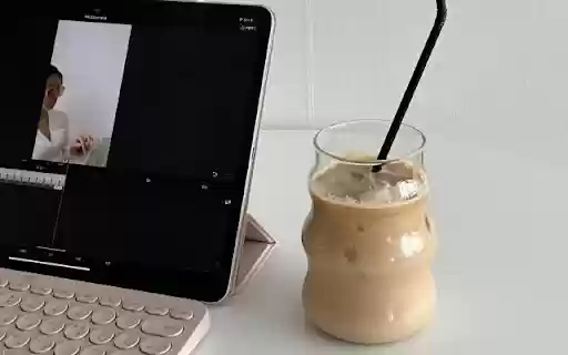 A Fresh Milk Coffee Beside an iPad  from Chrome web store to be run with OffiDocs Chromium online