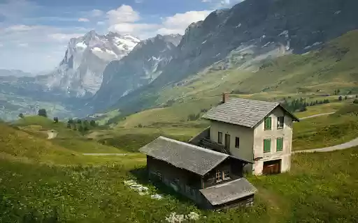 A mountain hut overlooks a spectacular valley in the Swiss alps  from Chrome web store to be run with OffiDocs Chromium online