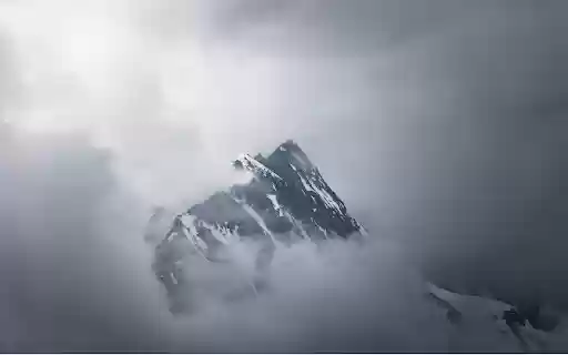 A mountain is seen in the clouds with a cloudy sky from Chrome web store to be run with OffiDocs Chromium online A mountain is seen in the clouds with a cloudy sky from Chrome web store to be run with OffiDocs Chromium online