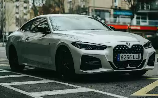 A Parked White Coupe  from Chrome web store to be run with OffiDocs Chromium online