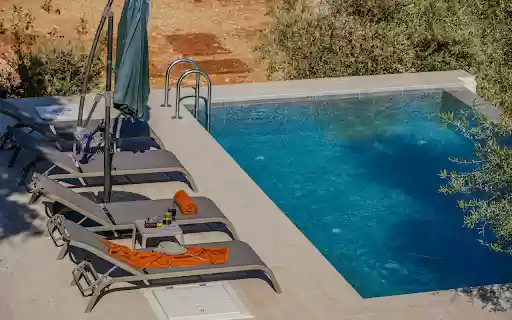 A pool with lounge chairs and umbrellas from Chrome web store to be run with OffiDocs Chromium online A pool with lounge chairs and umbrellas from Chrome web store to be run with OffiDocs Chromium online