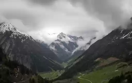 A valley with mountains and clouds in the background from Chrome web store to be run with OffiDocs Chromium online A valley with mountains and clouds in the background from Chrome web store to be run with OffiDocs Chromium online