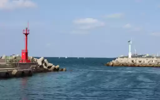 Coastal Harbor Entrance with Twin Lighthouses  from Chrome web store to be run with OffiDocs Chromium online