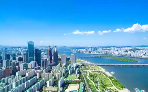 Expansive Metropolis by the River  from Chrome web store to be run with OffiDocs Chromium online