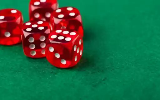 Five Transparent Red Dice on a Green Grass Background  from Chrome web store to be run with OffiDocs Chromium online