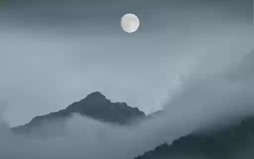 Full Moon over Foggy Mountains Covered With Clouds  from Chrome web store to be run with OffiDocs Chromium online