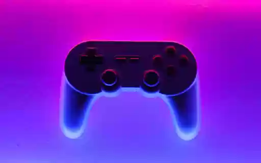Gaming Vibes: Controller on a Blue Purple Pink Gradient  from Chrome web store to be run with OffiDocs Chromium online