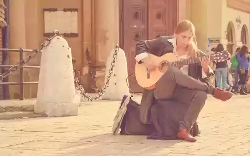 Girl playing guitar  from Chrome web store to be run with OffiDocs Chromium online