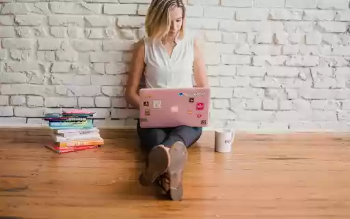 Girl sitting at work  from Chrome web store to be run with OffiDocs Chromium online