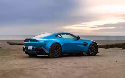 Green Aston Martin Theme: Luxury, Performance, and Elegance  from Chrome web store to be run with OffiDocs Chromium online