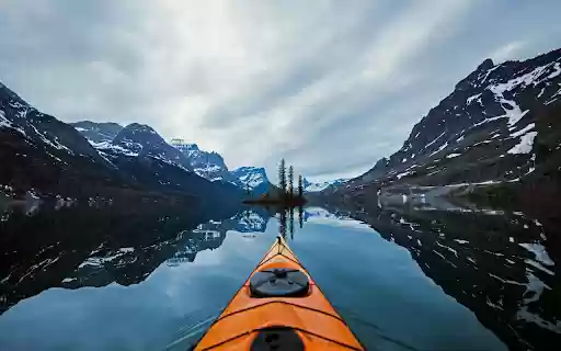 Kayaking on a Reflective Mountain Lake  from Chrome web store to be run with OffiDocs Chromium online