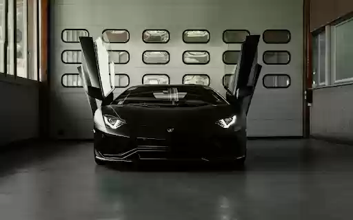 Luxury Black Car with Open Doors in Garage  from Chrome web store to be run with OffiDocs Chromium online