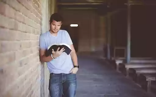 Man reading a book from Chrome web store to be run with OffiDocs Chromium online Man reading a book from Chrome web store to be run with OffiDocs Chromium online