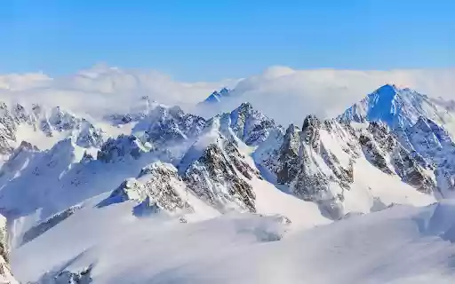 Mountain Ranges Covered in Snow  from Chrome web store to be run with OffiDocs Chromium online