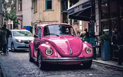 Pink Car Parked on the Street  from Chrome web store to be run with OffiDocs Chromium online