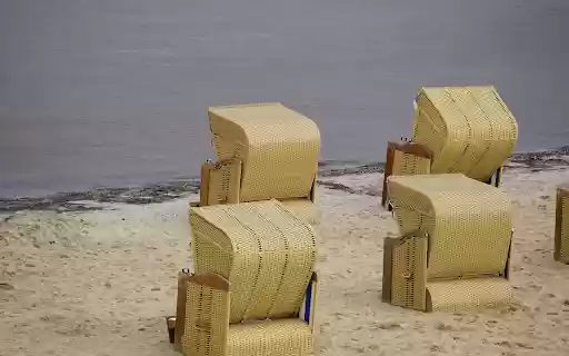 Rattan chairs on the beach  from Chrome web store to be run with OffiDocs Chromium online