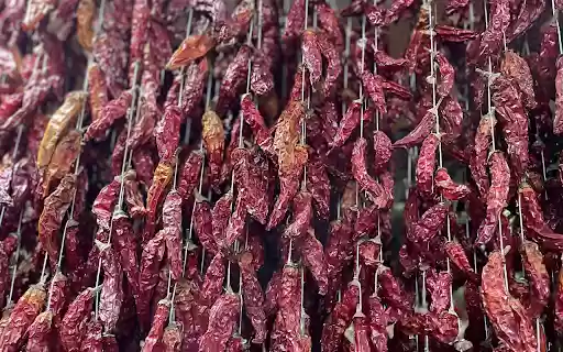 Red chili hanging in the wind  from Chrome web store to be run with OffiDocs Chromium online