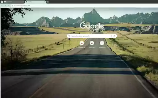 road winding through towering mountain ranges  from Chrome web store to be run with OffiDocs Chromium online