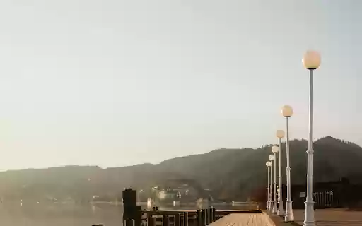 Serene Lakeside Boardwalk at Sunrise  from Chrome web store to be run with OffiDocs Chromium online