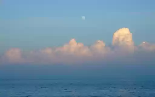 Serene Seascape Under a Pale Moon  from Chrome web store to be run with OffiDocs Chromium online