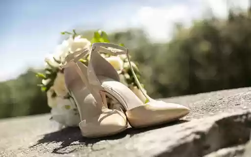 Shoes next to wedding flowers  from Chrome web store to be run with OffiDocs Chromium online