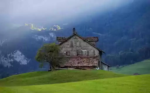 Small house on green grass hill  from Chrome web store to be run with OffiDocs Chromium online