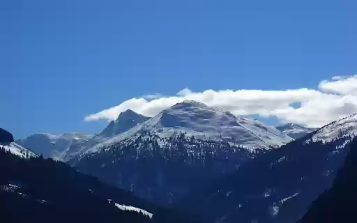 Snow capped mountains bask in the soft  from Chrome web store to be run with OffiDocs Chromium online