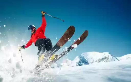 Thrilling Snow Adventure Theme – A Man Skiing Down the Slopes  from Chrome web store to be run with OffiDocs Chromium online