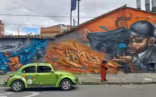 Vibrant Urban Street Art with Vintage Car  from Chrome web store to be run with OffiDocs Chromium online