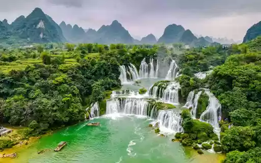 Waterfall in the Heart of a Green Forest  from Chrome web store to be run with OffiDocs Chromium online