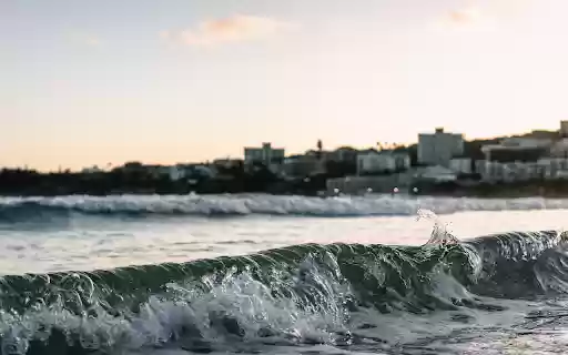 Waves roll onto the shore  from Chrome web store to be run with OffiDocs Chromium online