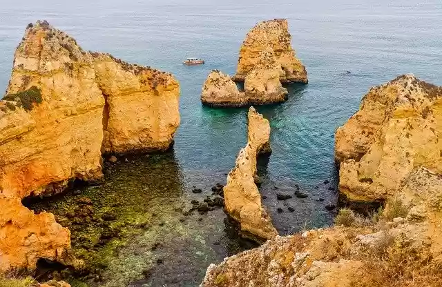 Free download sea rock boat rocks costa coast free picture to be edited with GIMP free online image editor