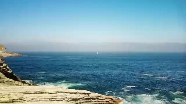 Free download sea seaside mountain rocks drone free picture to be edited with GIMP free online image editor