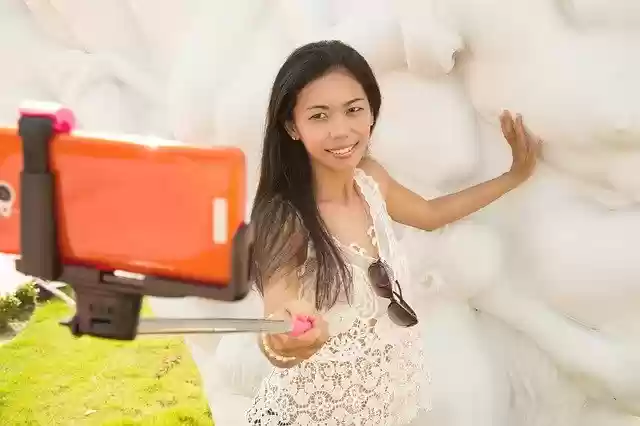 Free download selfie woman young selfie stick free picture to be edited with GIMP free online image editor