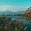 serene lake nestled among green trees  screen for extension Chrome web store in OffiDocs Chromium