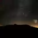 Silhouette of a Mountain under a Starry Night Sky  screen for extension Chrome web store in OffiDocs Chromium