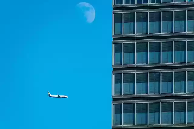 Free download skyscraper plane moon heaven free picture to be edited with GIMP free online image editor