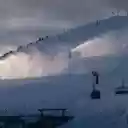 Snow Cannons Producing Snow on a Mountain Slope  screen for extension Chrome web store in OffiDocs Chromium