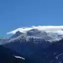 Snow capped mountains bask in the soft  screen for extension Chrome web store in OffiDocs Chromium