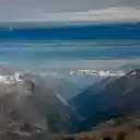 Snow Covered Mountains Under Blue Sky  screen for extension Chrome web store in OffiDocs Chromium