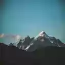 Snowy Mountain Peak Under Clear Sky  screen for extension Chrome web store in OffiDocs Chromium