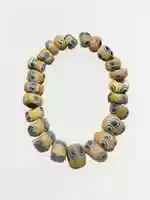 Free download String of twenty-three glass eye beads free photo or picture to be edited with GIMP online image editor