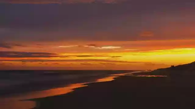 Безкоштовно завантажте Sunset Beach Ocean – безкоштовну фотографію чи зображення для редагування за допомогою онлайн-редактора зображень GIMP