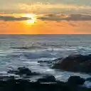 Sunset Sea and Rocks  screen for extension Chrome web store in OffiDocs Chromium