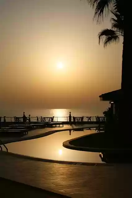Free download sunset sea pool palm tree sun eve free picture to be edited with GIMP free online image editor