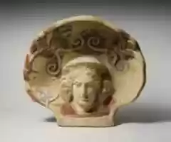 Free download Terracotta antefix (roof tile) with head of a maenad free photo or picture to be edited with GIMP online image editor