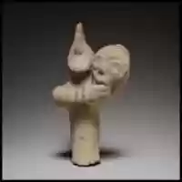 Free download Terracotta statuette of a male figure holding the head and neck of a mask or image free photo or picture to be edited with GIMP online image editor