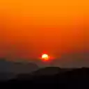 The sun behind the mountain  screen for extension Chrome web store in OffiDocs Chromium
